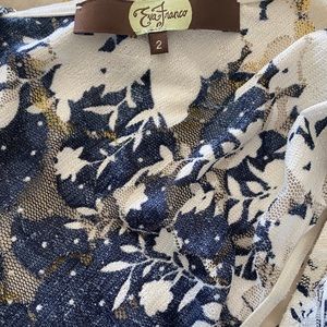 Laced flowing top with beautiful details.